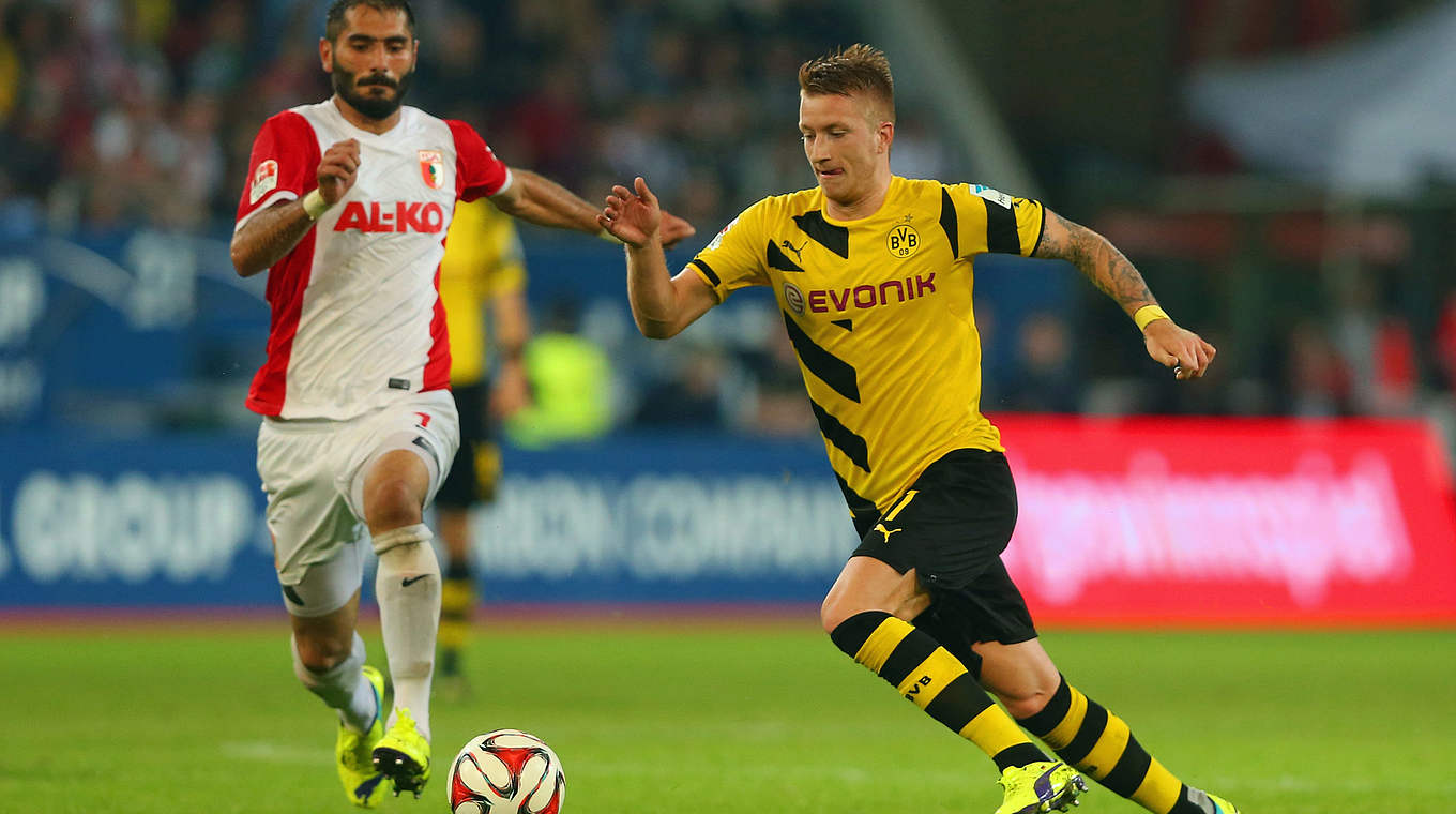 3:2 im Hinspiel beim FC Augsburg: Borussia Dortmund mit Marco Reus (r.) © 2014 Getty Images