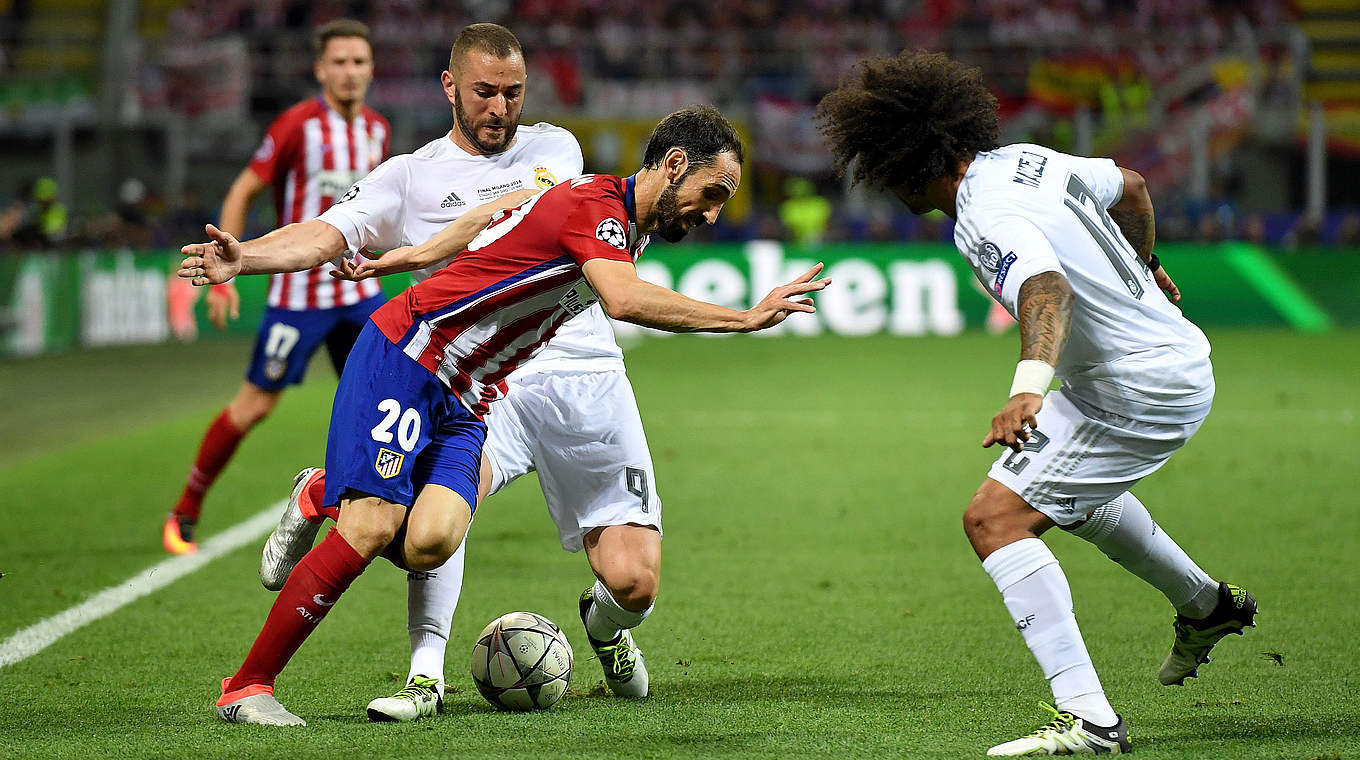 Voller Einsatz: Karim Benzema (l.) und Marcelo (r.) gegen Atleticos Juanfran © Getty Images